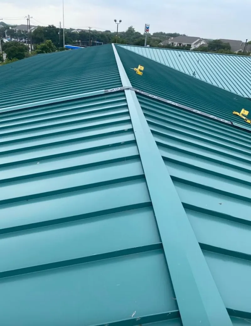 Green commercial metal roof ridge and valley for Metal Roof Repair in Geneva